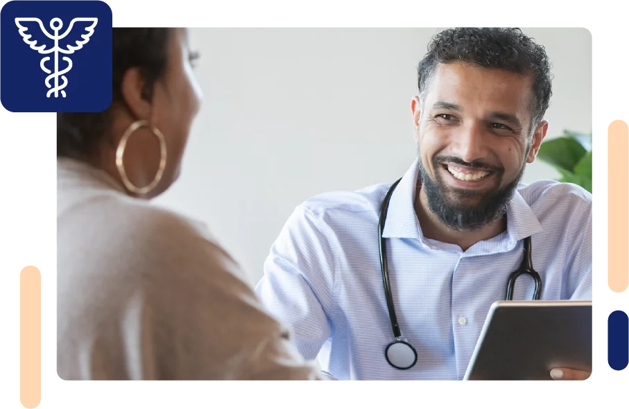 Locum Tenen smiling and talking to a patient 